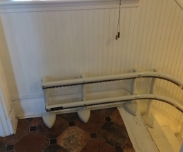 Chairlift rails at the top of the stairs