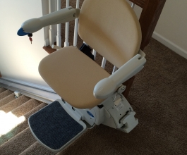 Chairlift for stairs with seat open